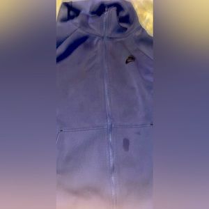 I’m selling on Nike purple, rare tech fleece watermark on the pocket not a stain